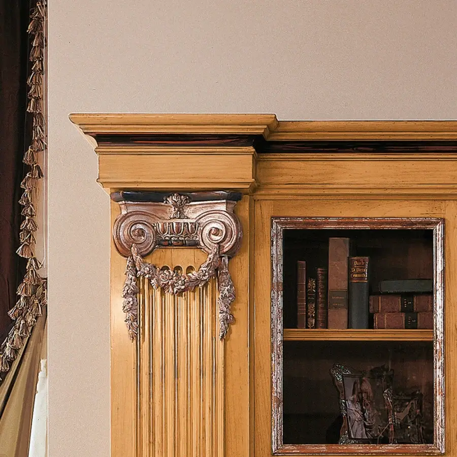 Exceptional Provasi 0690 bookcase built in noble cherrywood with silver leaf and dark blue-grey floral carvings