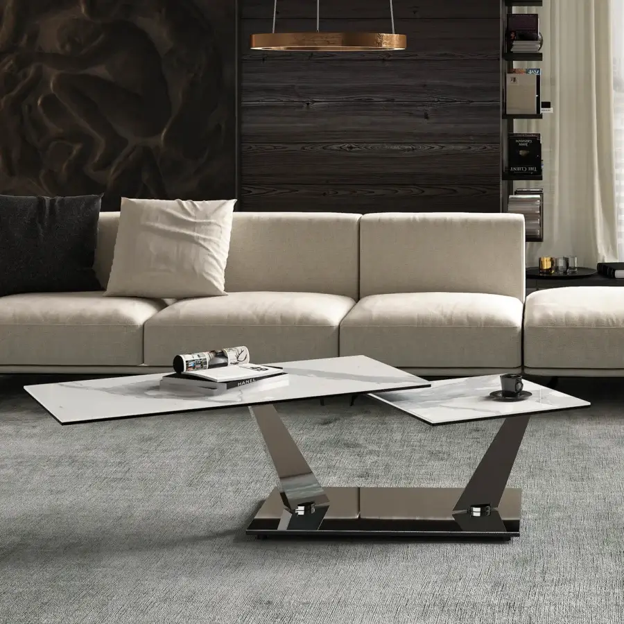 Distinguished Naos Aquilyps coffee table crafted with synchronized revolving clear glass tops and dark-toned galvanized steel base