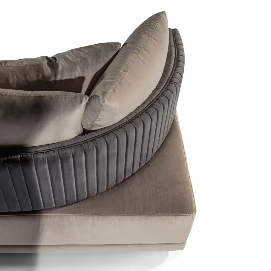 Elegant Visionnaire Miller Unicum sofa upholstered in quilted muted beige-grey fabric with satin black nickel aluminum base