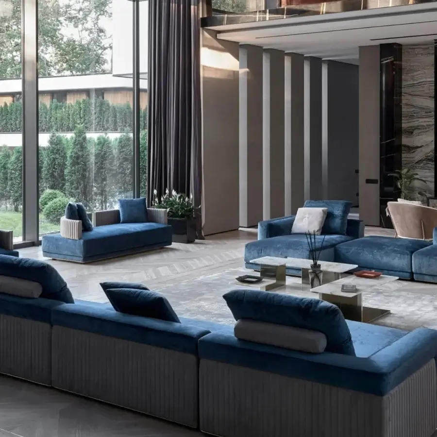 Exceptional Visionnaire Miller Unicum sofa crafted with blue velvet upholstery and quilted cannetté, built with a satin black nickel aluminum base
