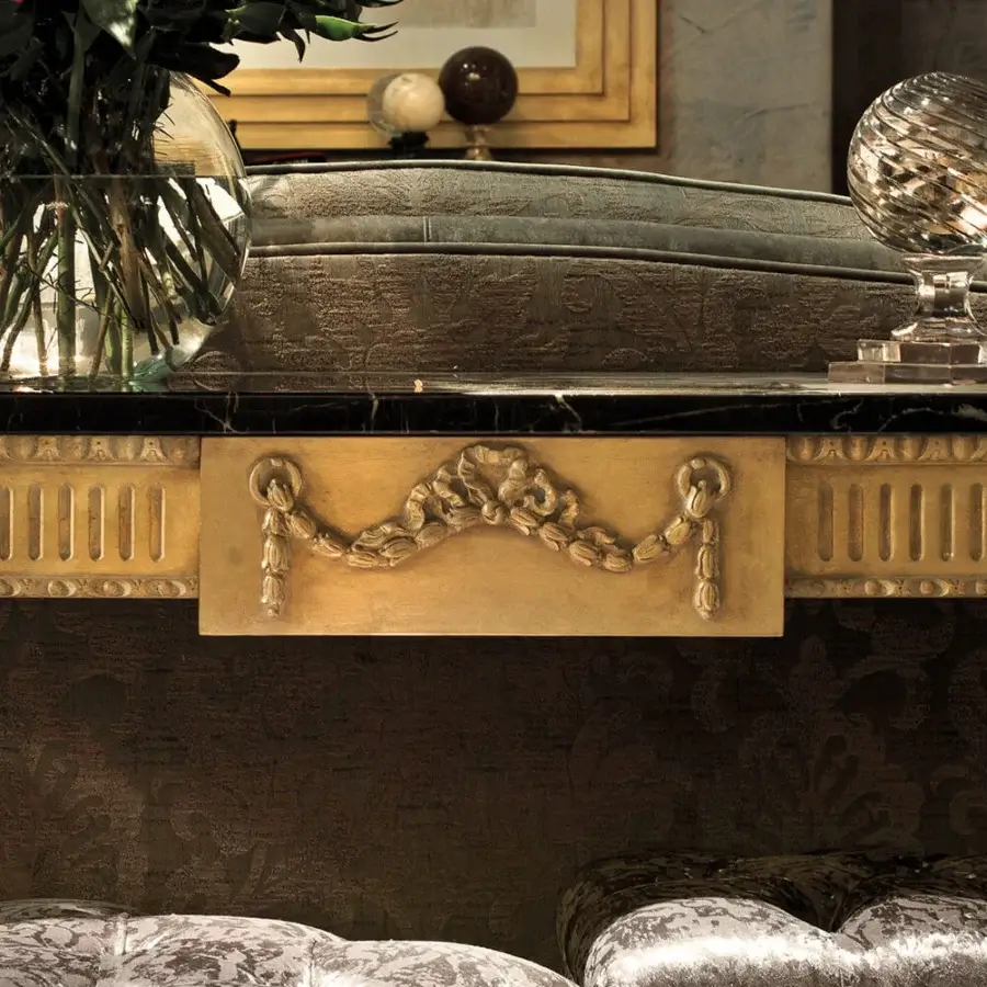 Lavish Provasi 0270 console built with black marble and a lacquered wood finish exhibiting gilded detailing