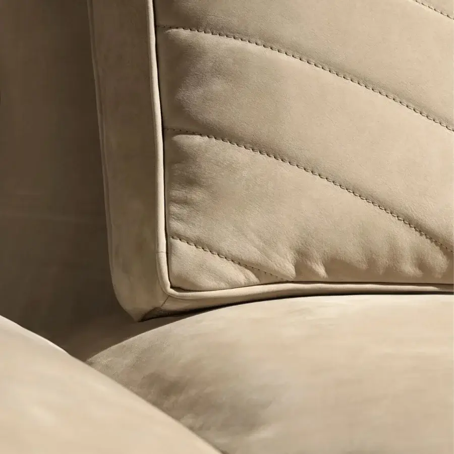 Distinctive Visionnaire Xavier sofa upholstered in matte beige textile with quilted chevron back and sleek platform base