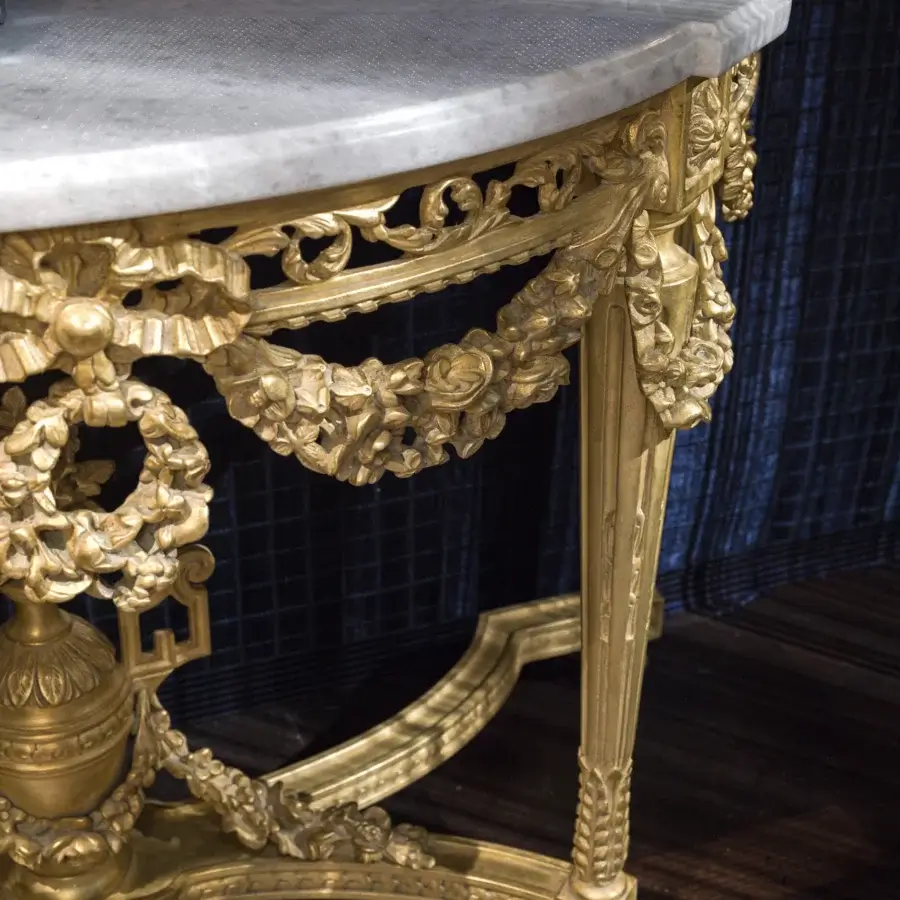 Lavish Provasi 2822 console crafted in Italy with gold finish, ornate carvings and a substantial white marble slab