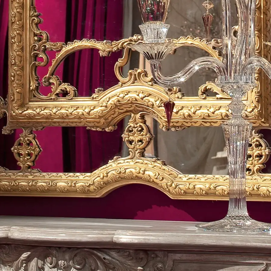 Exquisite Provasi 1107 mirror handcrafted in Italy with antique gold light patina and curvilinear wood carvings