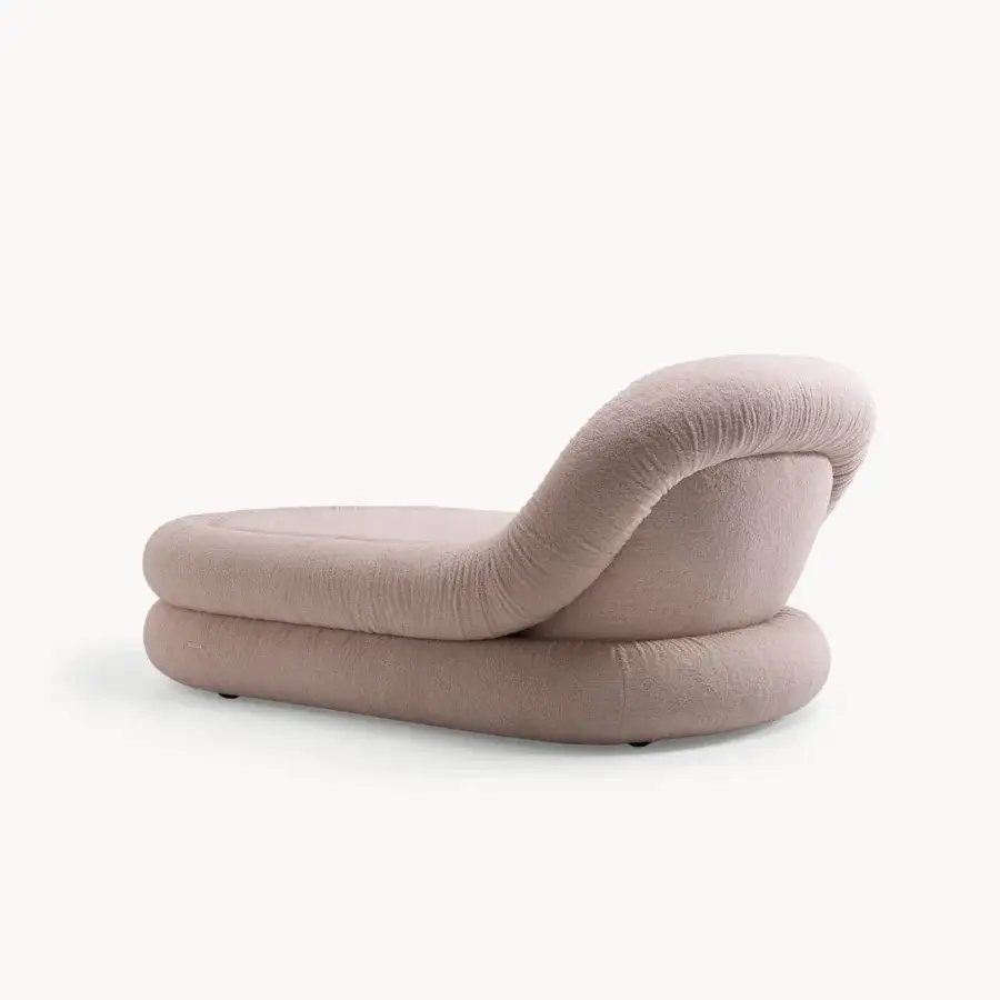 Superior Visionnaire Fedro chaise lounge with rounded form upholstered in textured matte beige textile and durable plywood frame