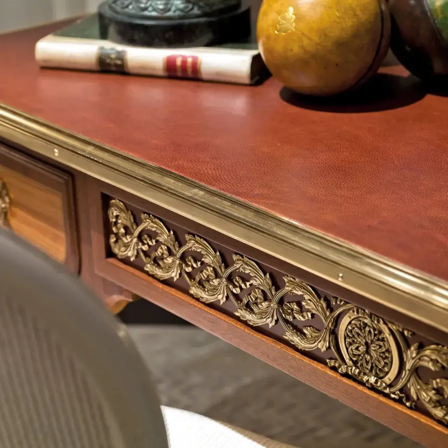 Exquisite Provasi 0415 desk crafted in reddish-brown leather with ornate gold-toned brass accents and scrolling floral patterns