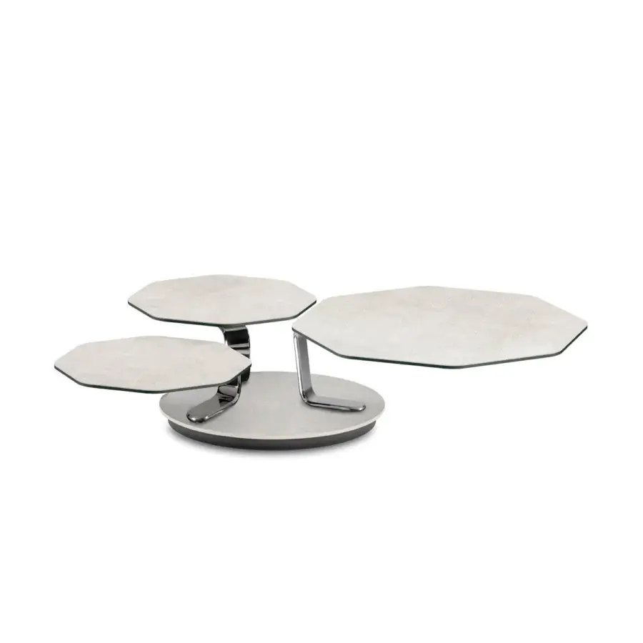 Sophisticated Naos Batis coffee table with pale gray stone composite surfaces and polished steel support exhibiting an angular matte finish