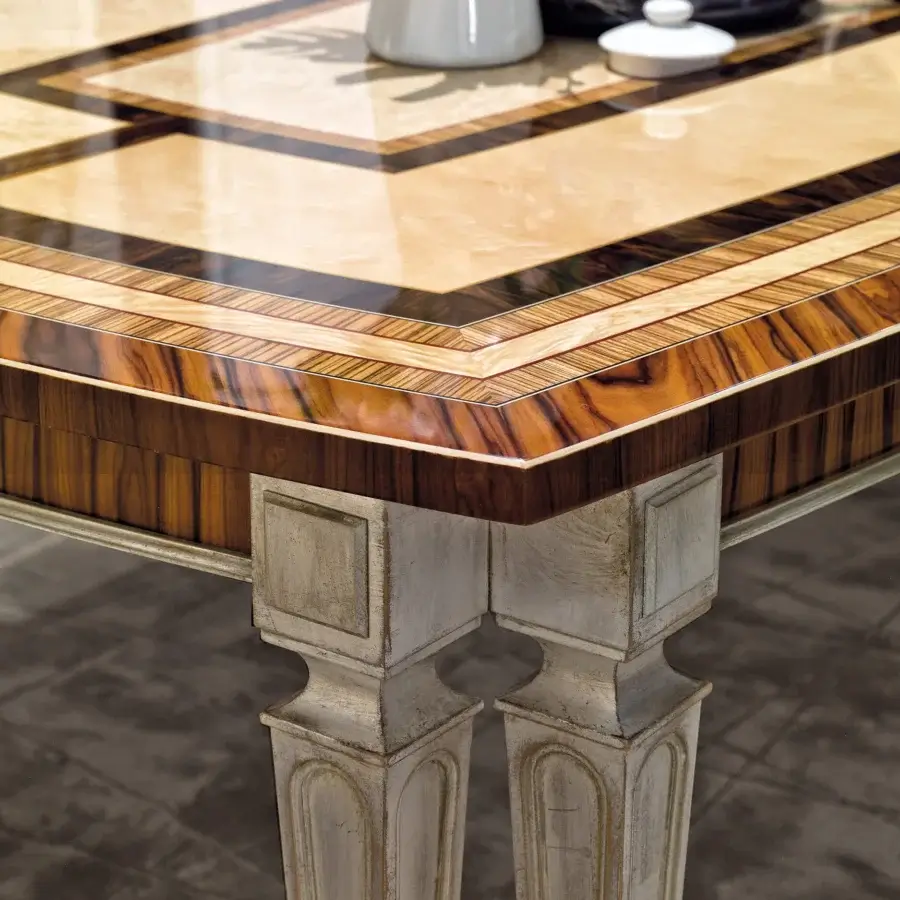 Exceptional Provasi 1703 extendable table built with Palissander, Zebrano, Erable, and Ziricote wood veneers in warm brown tones with gold grey patina