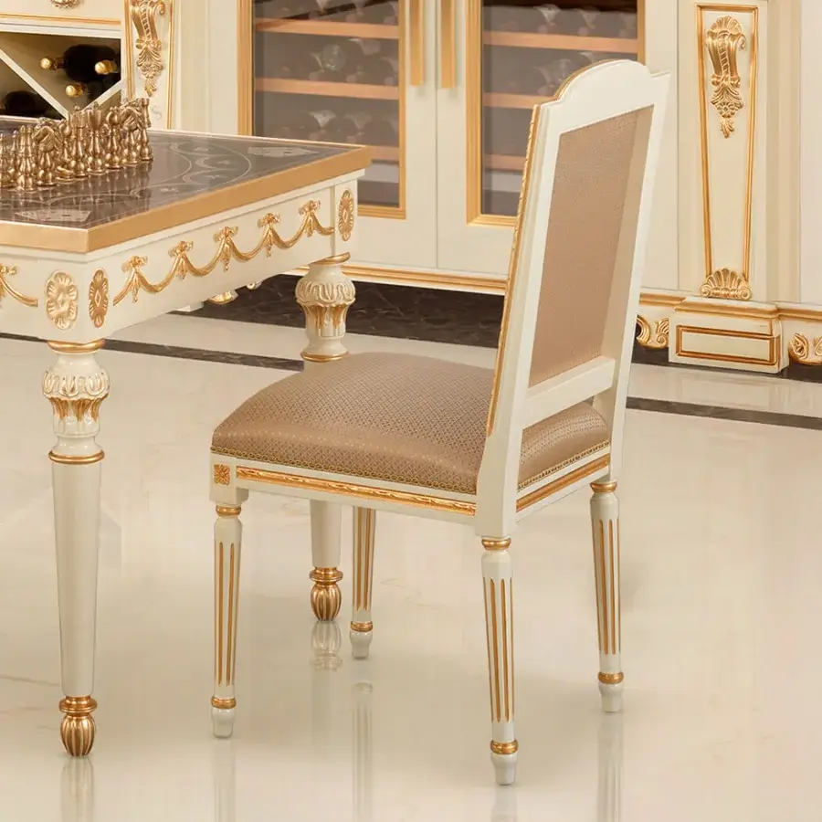 Exquisite Modenese Royal Symphony chair in pale blush fabric with cream wood and gold detailing