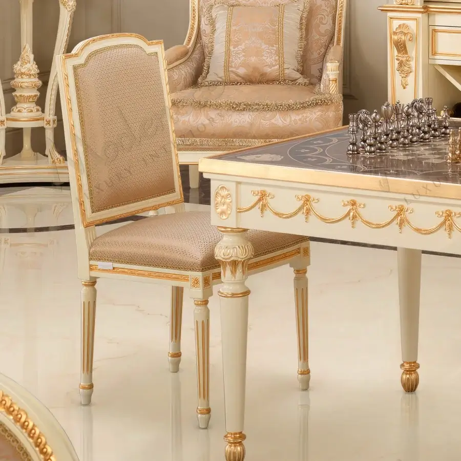 Superior Modenese Royal Symphony chair upholstered in pale blush fabric with glossy white and gold accents