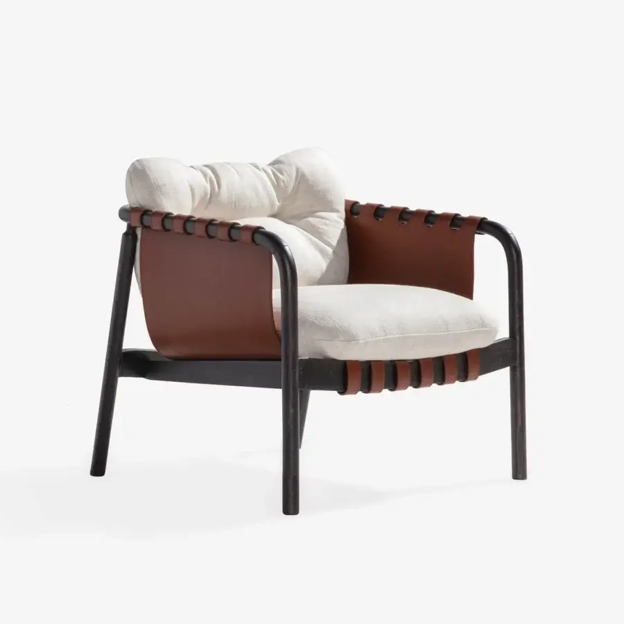 Distinguished Carpanese Home Bridge lounge chair crafted with beech wood and light textile upholstery, accented by warm brown leather with visible rivets