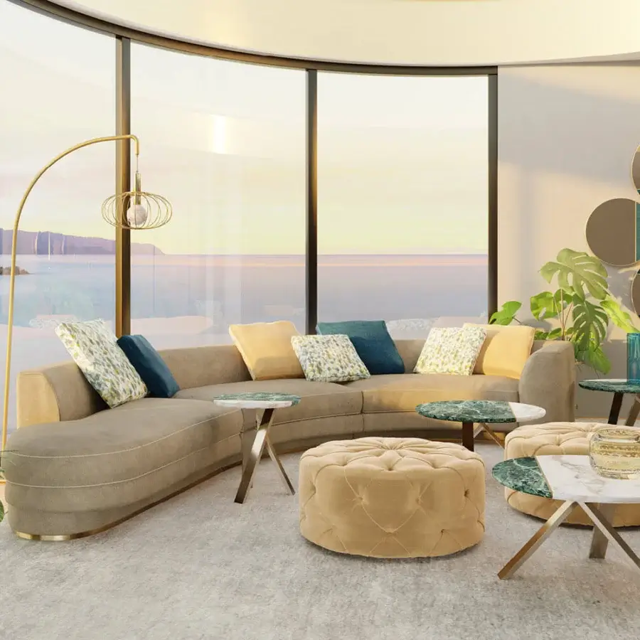 Harmonious Borzalino Franklin curved sofa upholstered in beige textile with patterned cushions and subtle metallic base