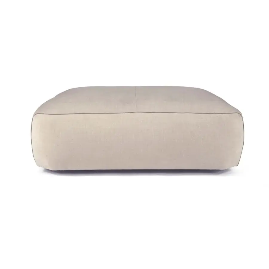 Superior Borzalino Franklin ottoman upholstered in neutral beige textile with channelled feather quilt and lacquered wood feet