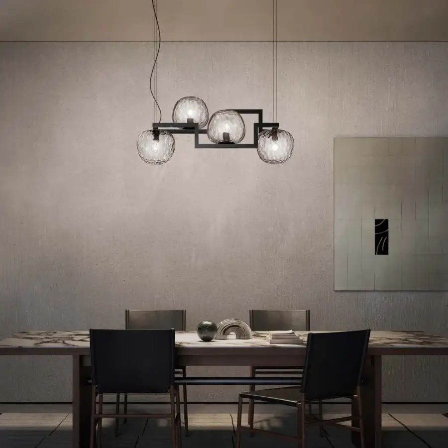 Distinguished Vistosi Globose suspension lamp crafted in matte black metal with clear glass diffusers offering a balanced glow