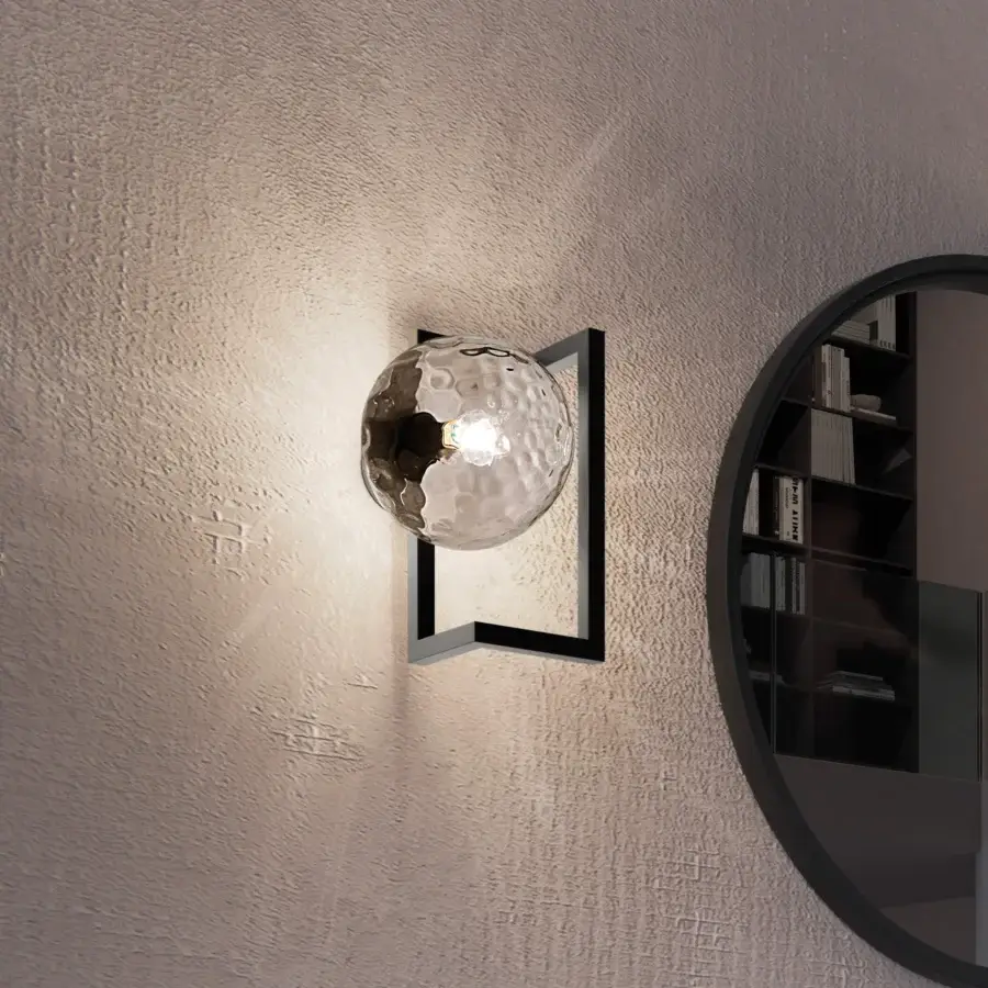 Exclusive Vistosi Globose wall lamp crafted in matte black metal with hand-blown glass diffuser for a captivating glow