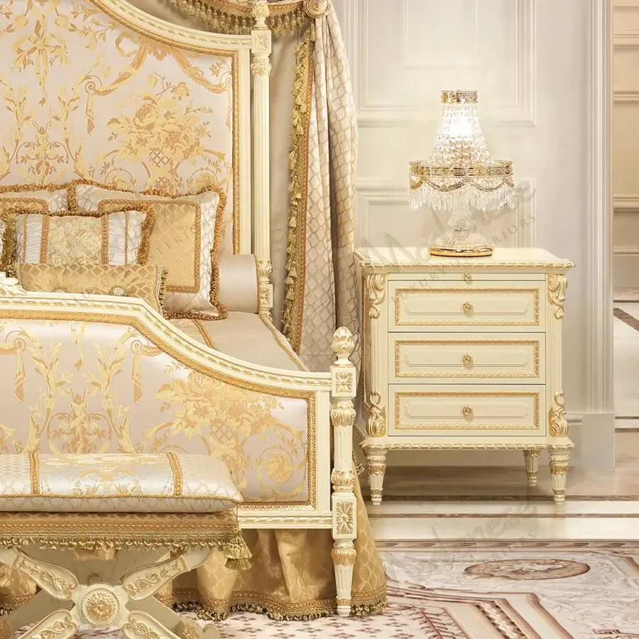 Exquisite Modenese Golden Radiance nightstand crafted in cream-colored paint with ornate gold detailing and delicate floral carvings