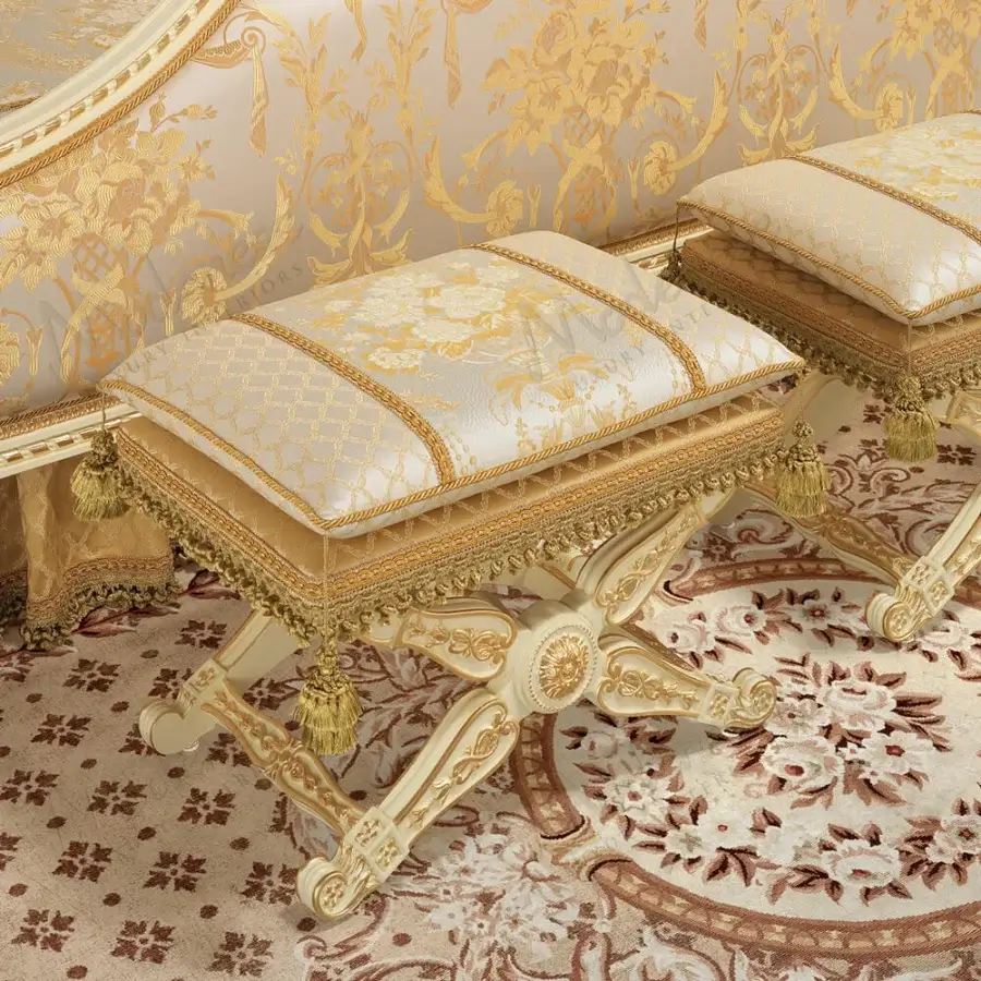Lavish Modenese Golden Radiance ottoman with cream and gold damask fabric upholstery and a glossy carved wooden frame