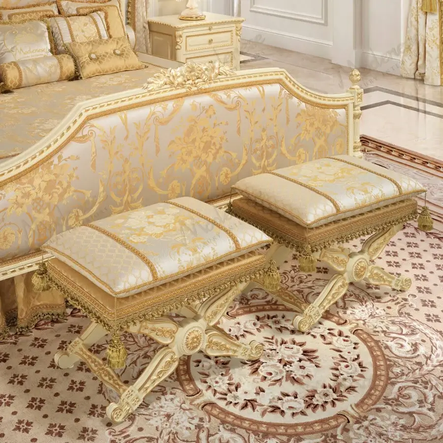 Lavish Modenese Golden Radiance ottoman crafted in cream and gold damask fabric with a gilded, intricately carved wood frame