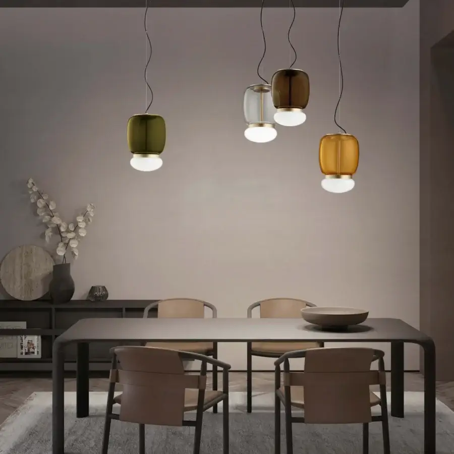 Exceptional Vistosi Faro suspension lamp crafted in transparent olive green glass with a glossy white element and satin metallic accents