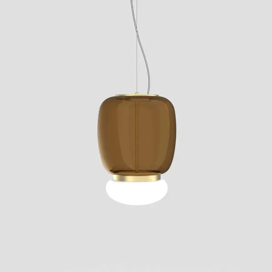 Elegant Vistosi Faro suspension lamp handcrafted in luminous amber translucent glass with glossy white diffuser