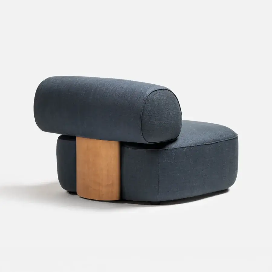 Sophisticated Carpanese Home Slow P lounge chair with plush textile upholstery and satin finished wooden structure