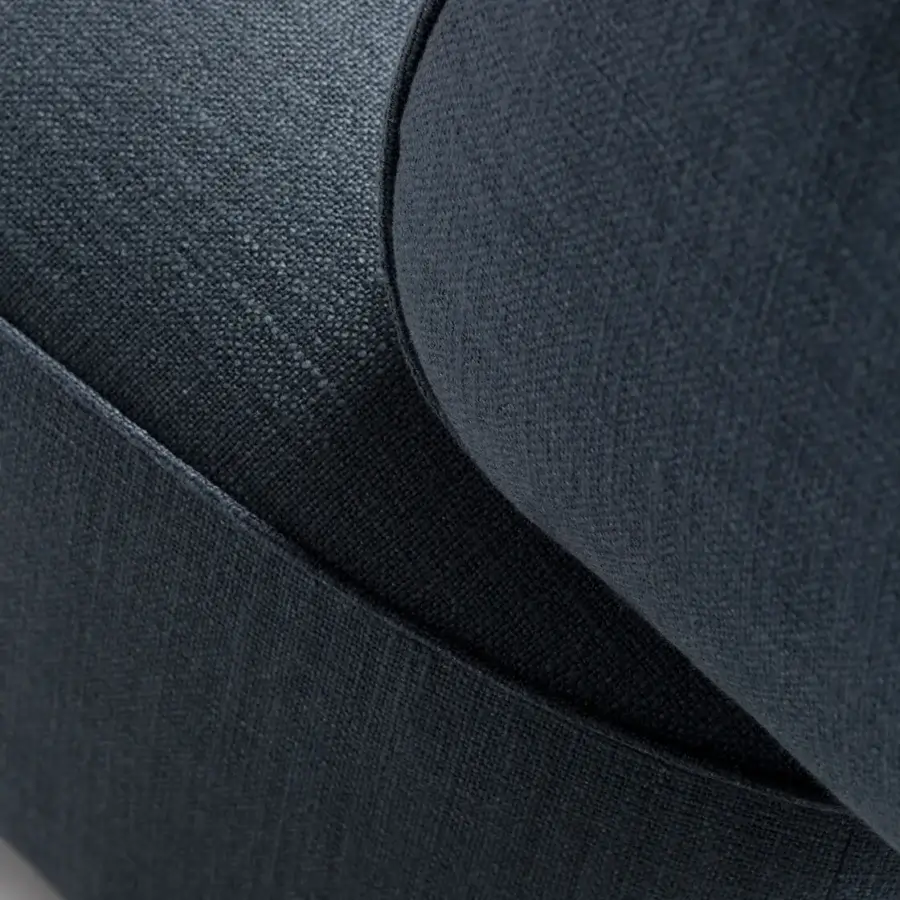 Captivating Carpanese Home Slow P lounge chair in dark teal woven textile with a curved wooden structure