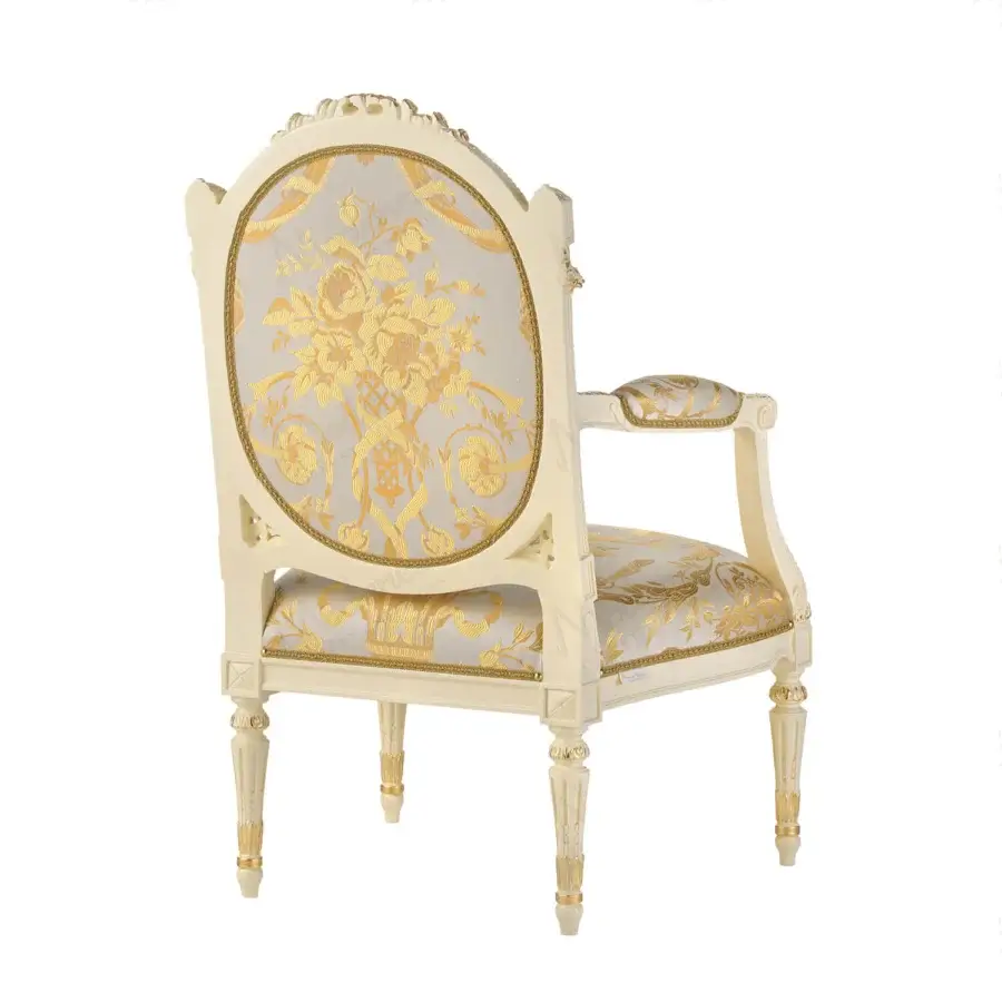 Distinguished Modenese Golden Radiance lounge chair with ivory wood frame and gold-leaf embellishments, showcasing cream upholstery with a golden floral motif