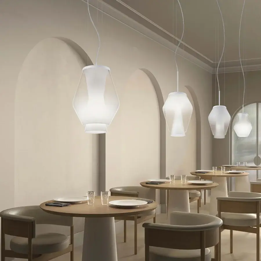 Elegant Vistosi Anisette suspension lamp crafted in Italy with superimposed shaded white crystal diffusers and curved form