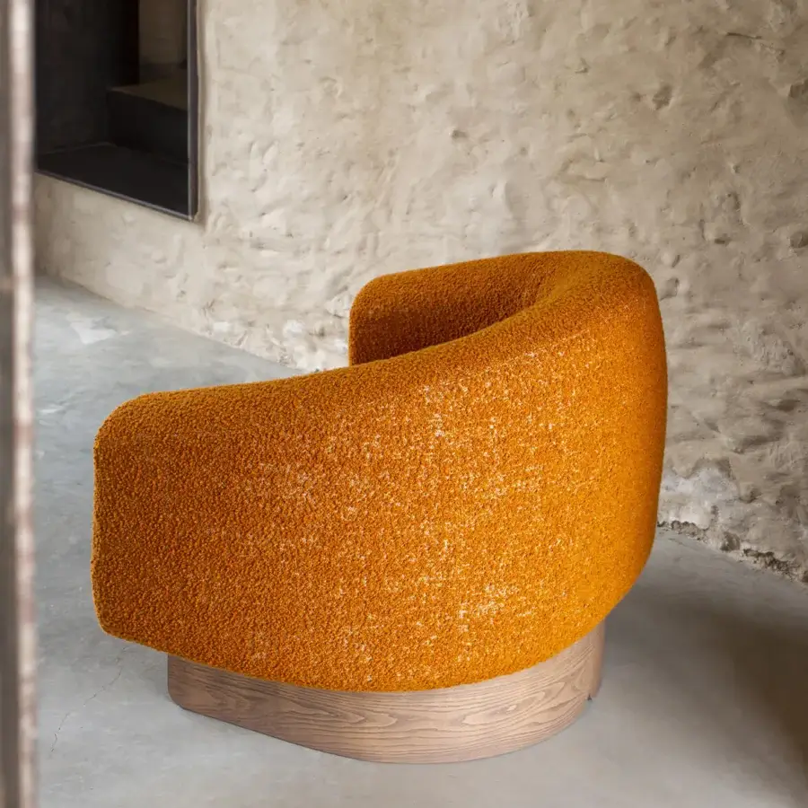 Superior Carpanese Home Betty lounge chair in golden-yellow textured textile with a natural light wood base