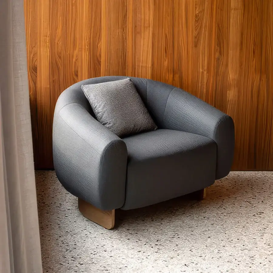 Elegant Carpanese Home Betty lounge chair with muted gray textile upholstery and a satin-finished light-toned wood base