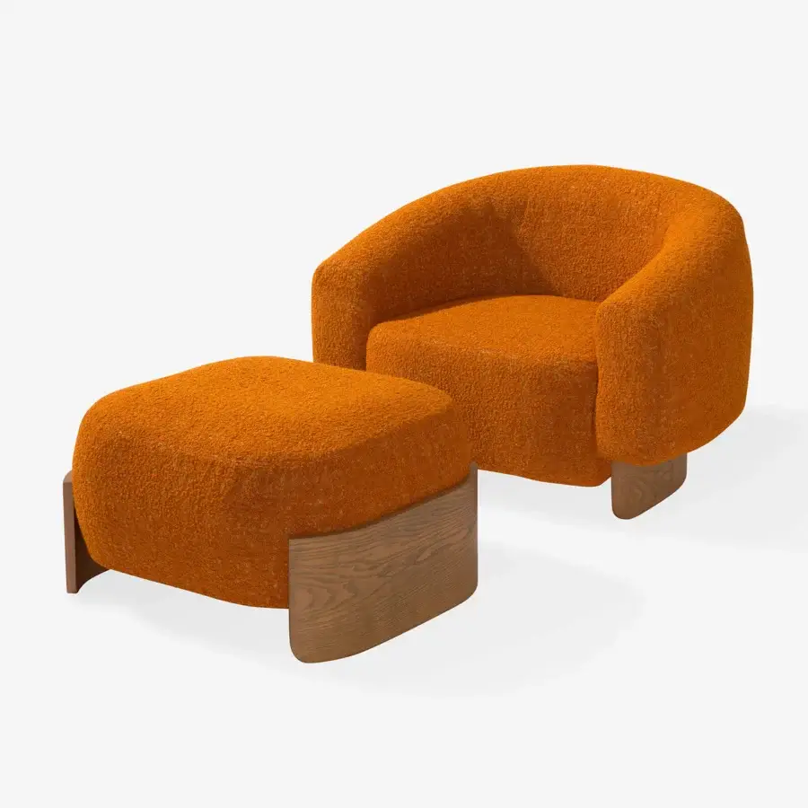 Exceptional Carpanese Home Betty lounge chair with saturated orange bouclé weave and satin finished wood base