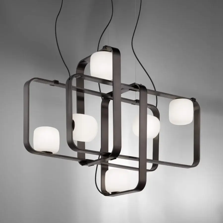 Exceptional Vistosi Groove suspension lamp with a rectangular anthracite metal frame and softly glowing spherical glass shades crafted in Italy
