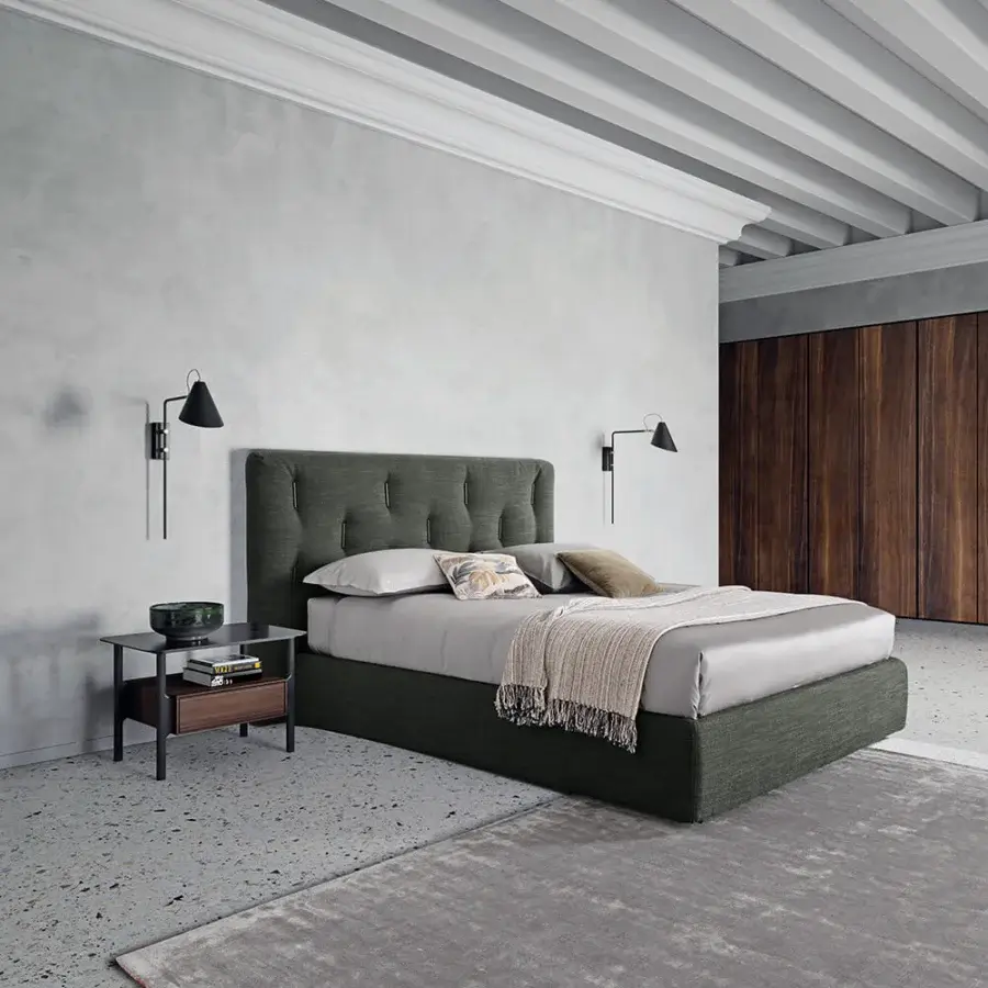 Distinguished Dallagnese Bars bed with a tall button-tufted headboard upholstered in olive green fabric or eco-leather with wooden inserts and conical black feet