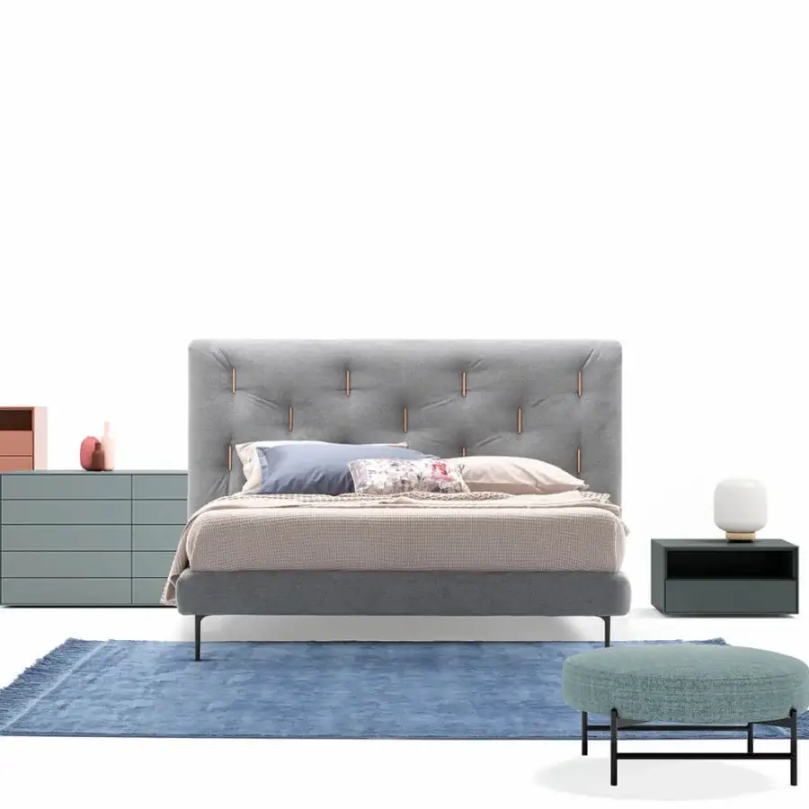Distinguished Dallagnese Bars bed with vertically channeled headboard upholstered in muted gray fabric and dark metal legs