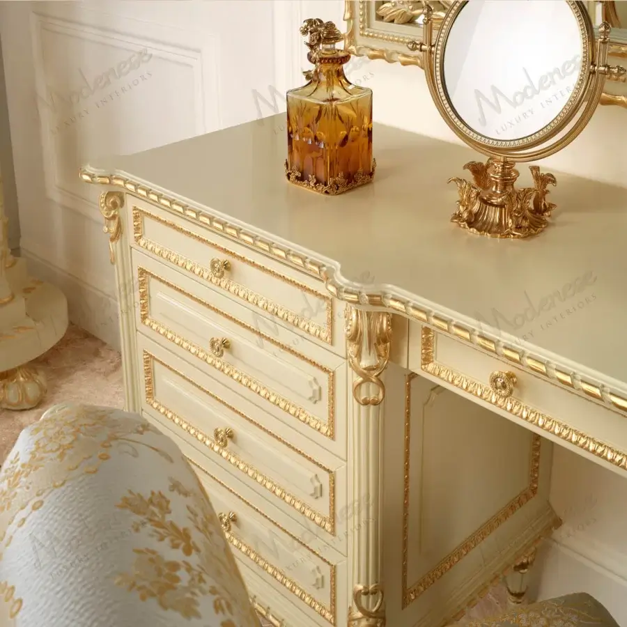 Lavish Modenese Golden Radiance vanity crafted in Italy with cream-colored wood and gold detailing exhibiting classic sculpted floral motifs
