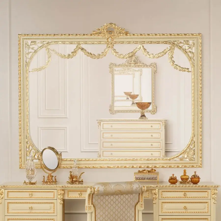 Exceptional Modenese Golden Radiance shaped mirror crafted in wood with high-gloss gold finish and sculpted foliage
