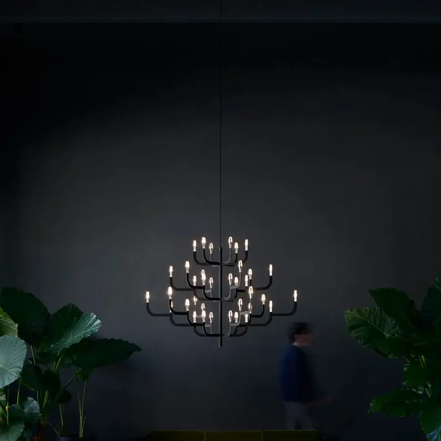 Exceptional Luceplan J-Us XL chandelier built in layered materials with a matte black finish delivering warm illumination