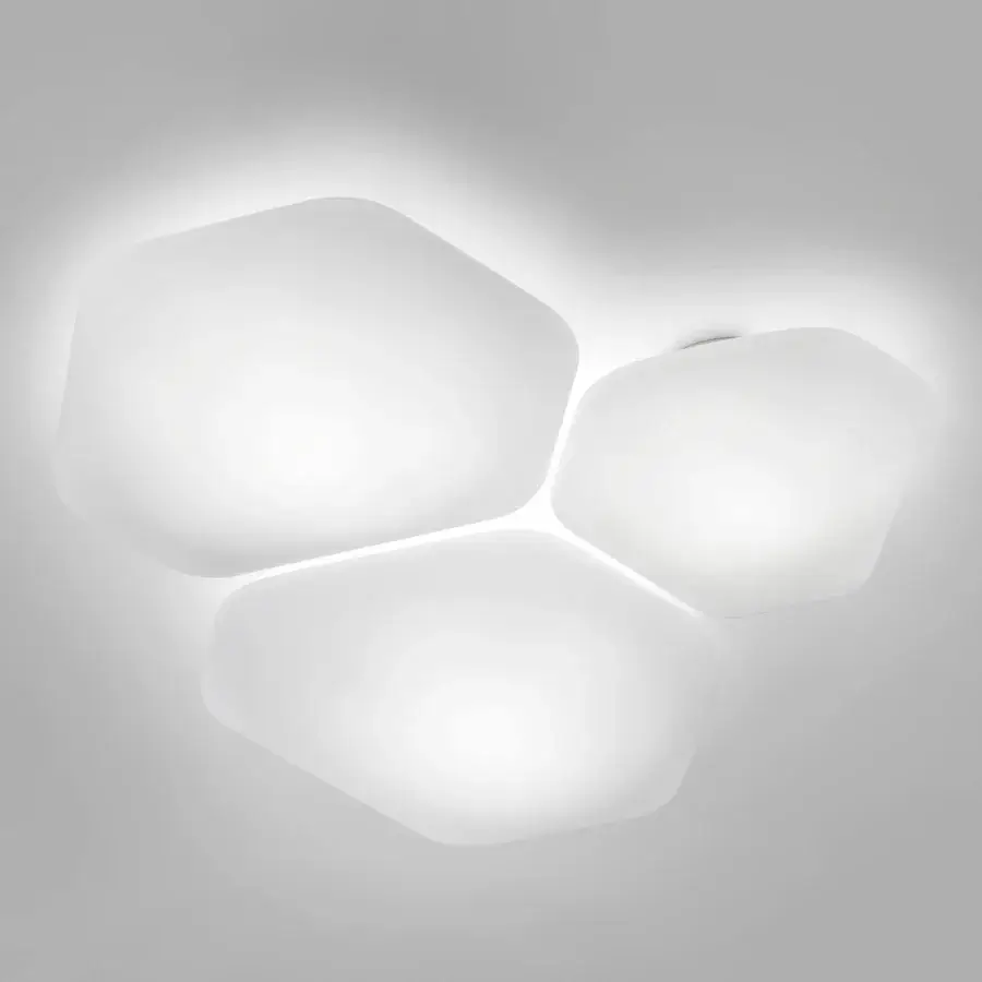 Captivating Vistosi Modulor ceiling lamp crafted in beveled glass with a bright neutral white finish and interconnected modules