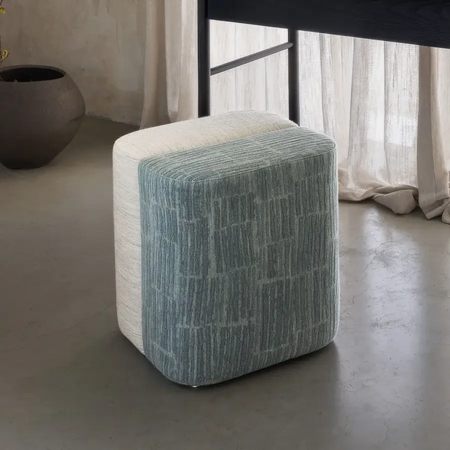 Exceptional Carpanese Home Rocha ottoman crafted with muted blue-green striped textile and a contrasting beige base band