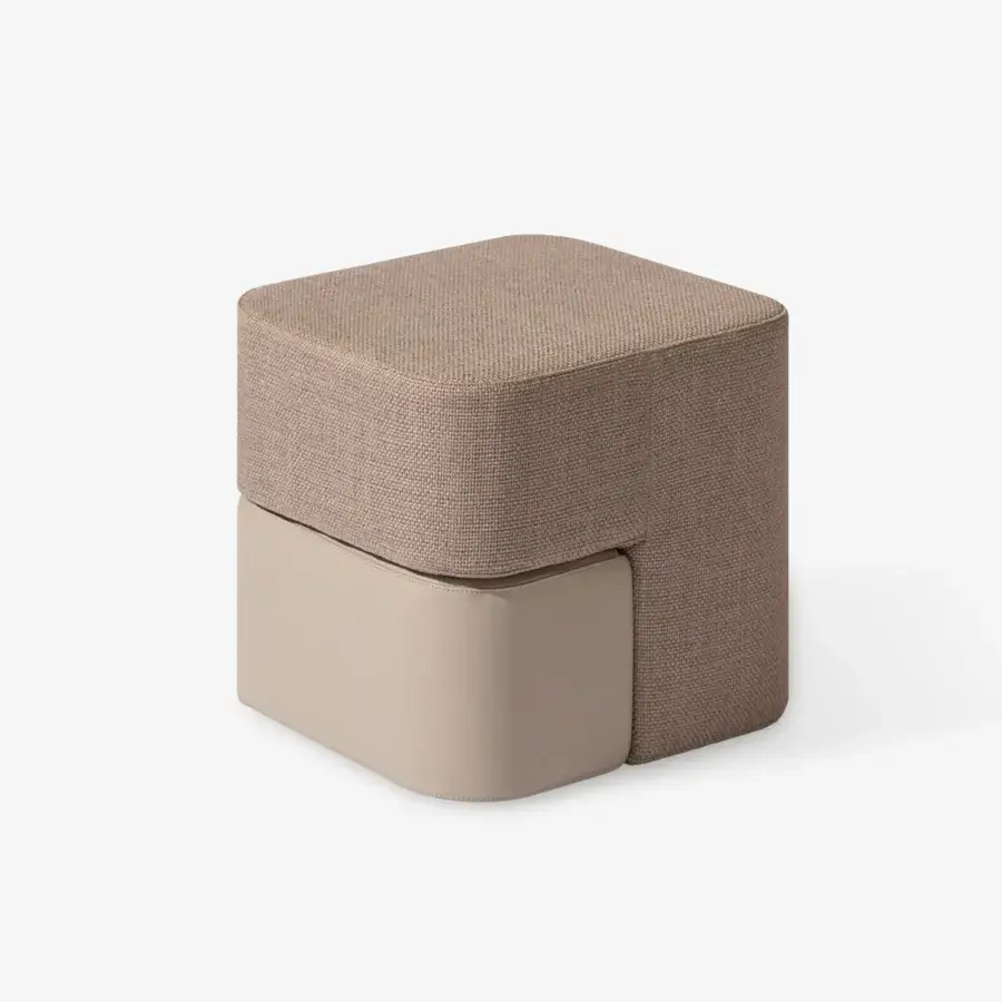 Sophisticated Carpanese Home Rocha ottoman built with textured matte beige-brown fabric and geometric tiered design