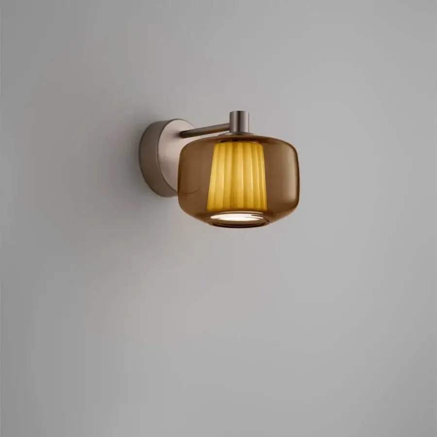 Distinguished Vistosi Plissé wall lamp with sinuous blown glass diffuser and muted bronze-finished metal arm