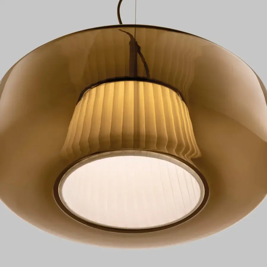 Exceptional Vistosi Plissé suspension lamp with glossy amber blown glass and pleated off-white fabric shade crafted with refined metal finishes