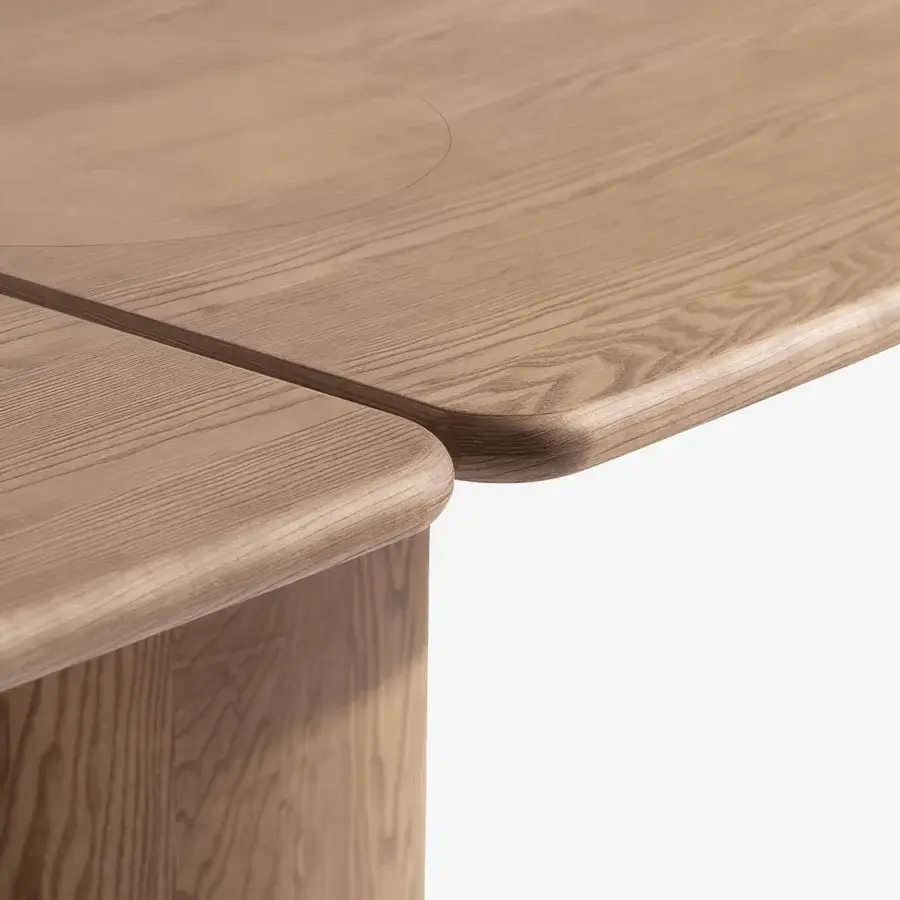 Superior Carpanese Home Ladybug table with flowing lines and cylindrical legs crafted in warm medium-brown ash wood with a satin finish