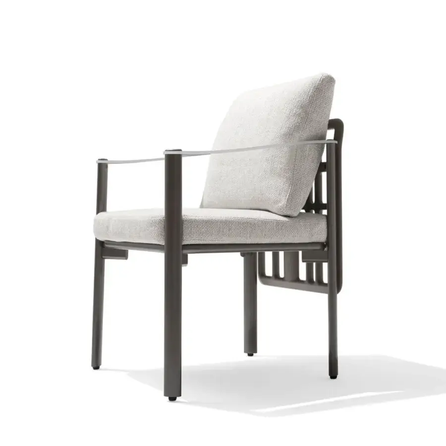Superior Giorgetti Aldìa armchair with a sleek metal frame and sculptural birch plywood details upholstered in light gray waterproof fabric
