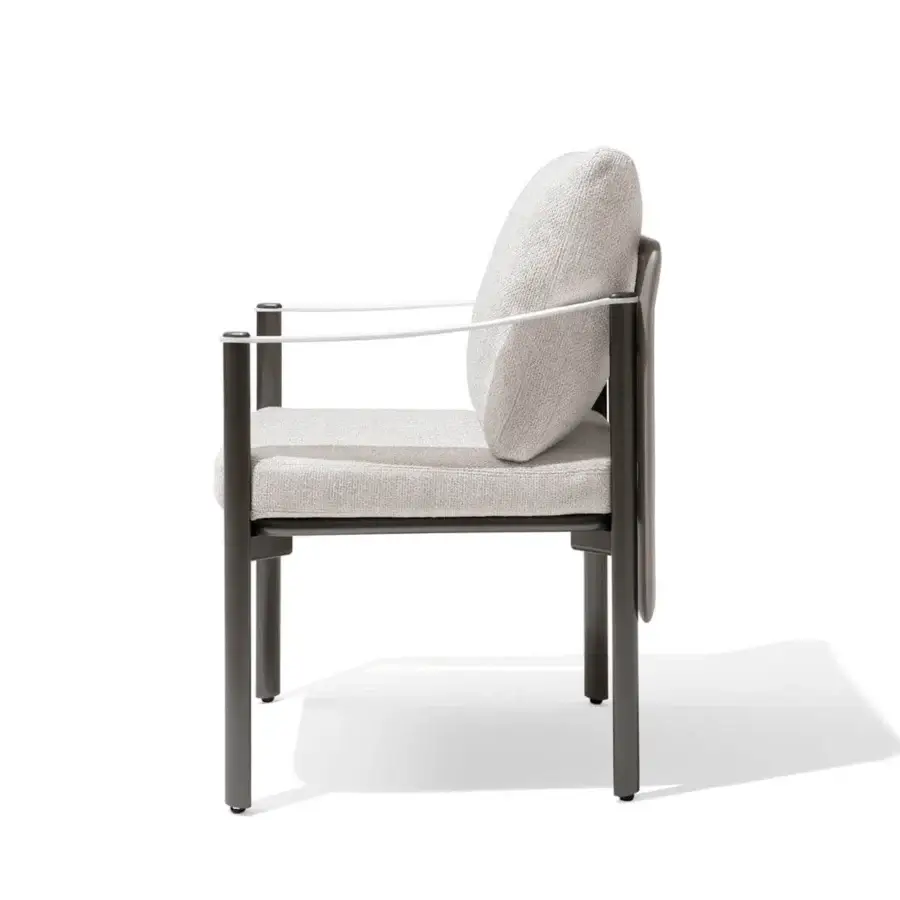Refined Giorgetti Aldìa armchair with a sleek metal frame and generously cushioned neutral beige textile upholstery in a matte dark gray finish