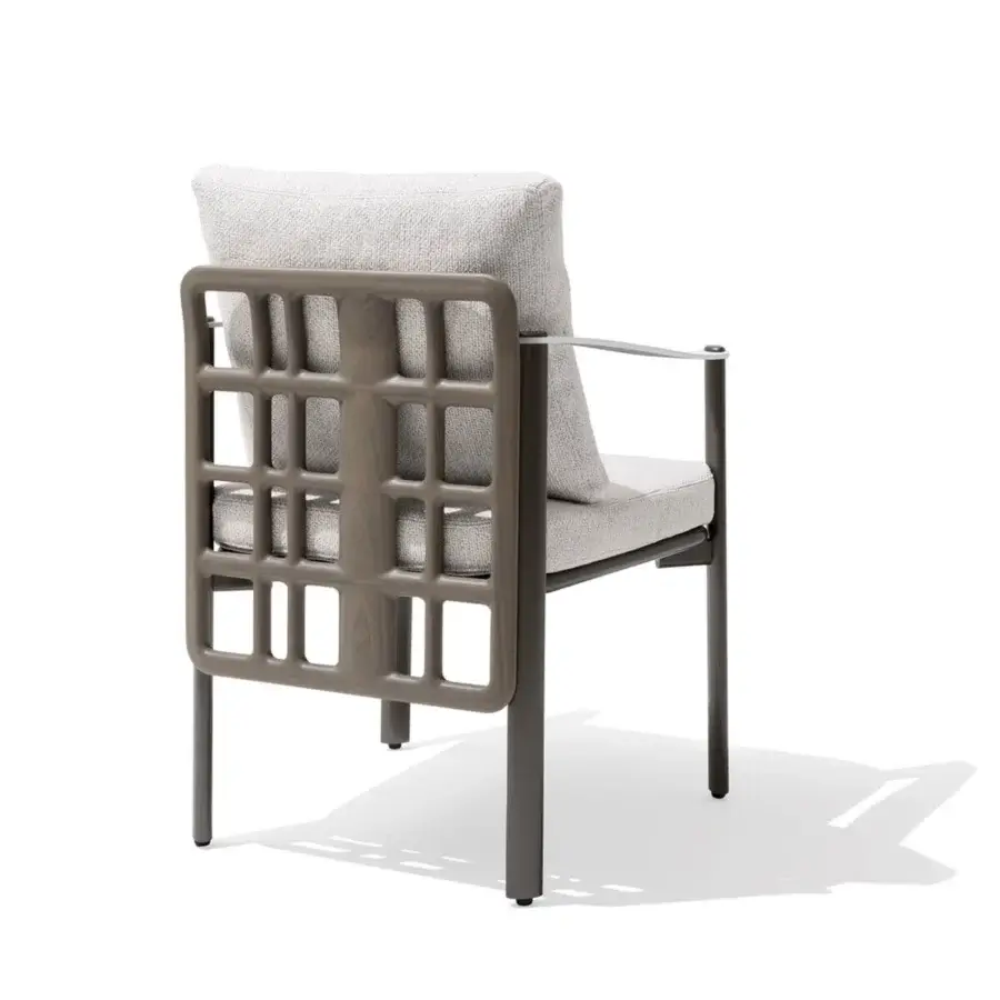 Exceptional Giorgetti Aldìa armchair with a sleek metal frame and sculptural birch plywood details in light gray waterproof fabric