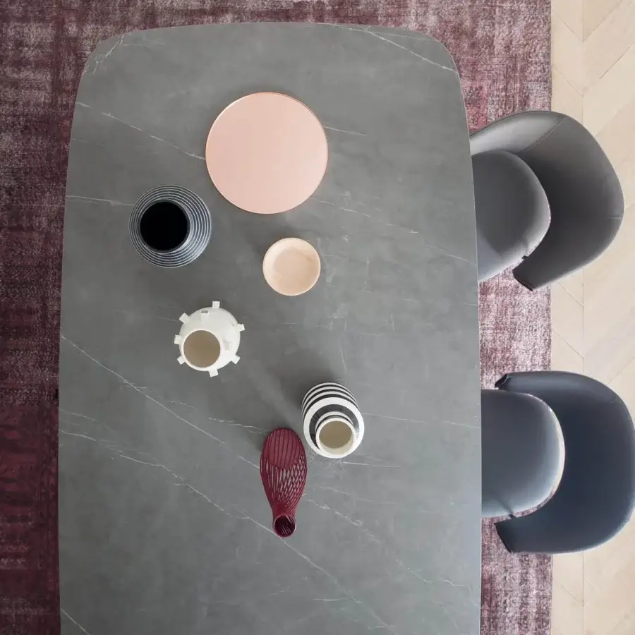 Exceptional Bonaldo Cop table with a gray marbled tabletop and painted metal base inspired by bottles