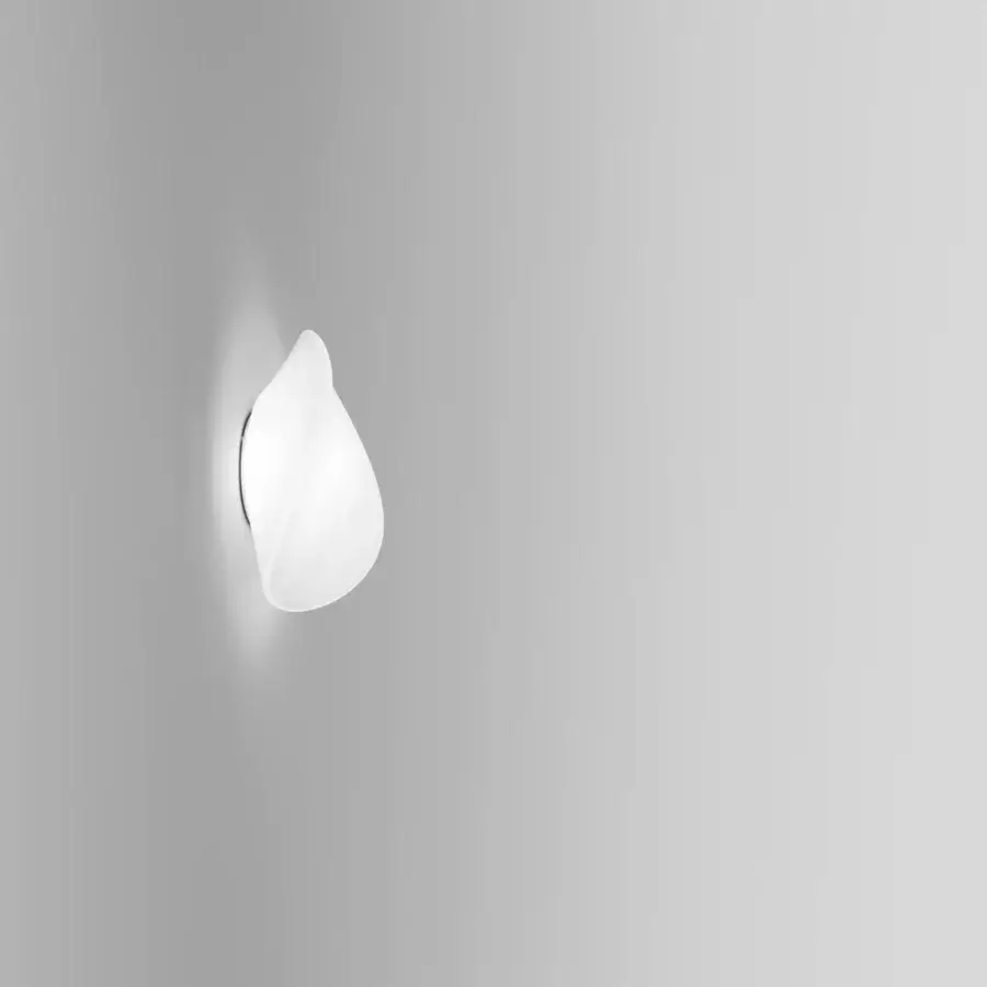 Distinguished Vistosi Balance wall lamp crafted with translucent white hand-blown glass and an organic asymmetrical form
