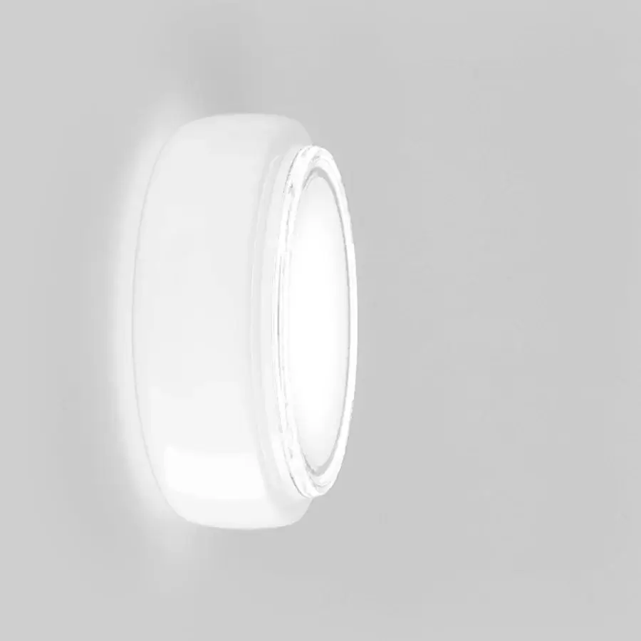 Distinguished Vistosi Bot wall lamp crafted in glossy white glass bringing a fluid sculptural quality to interiors
