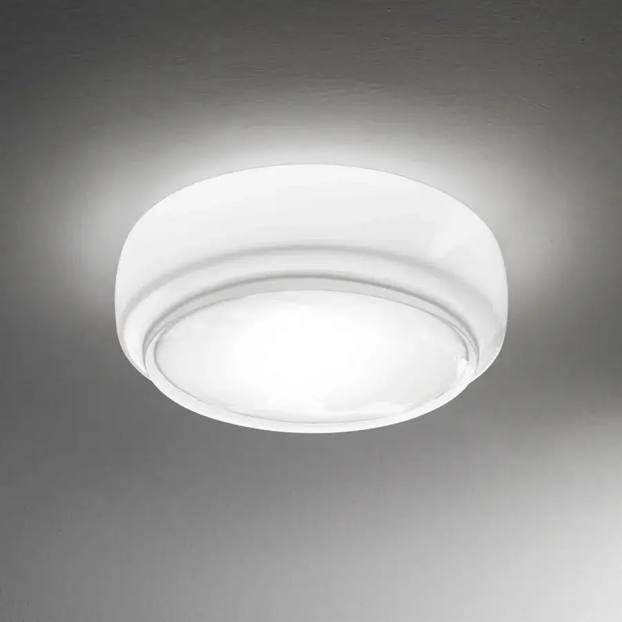 Superior Vistosi Bot ceiling lamp crafted with glossy white glass radiating soft light for modern interiors